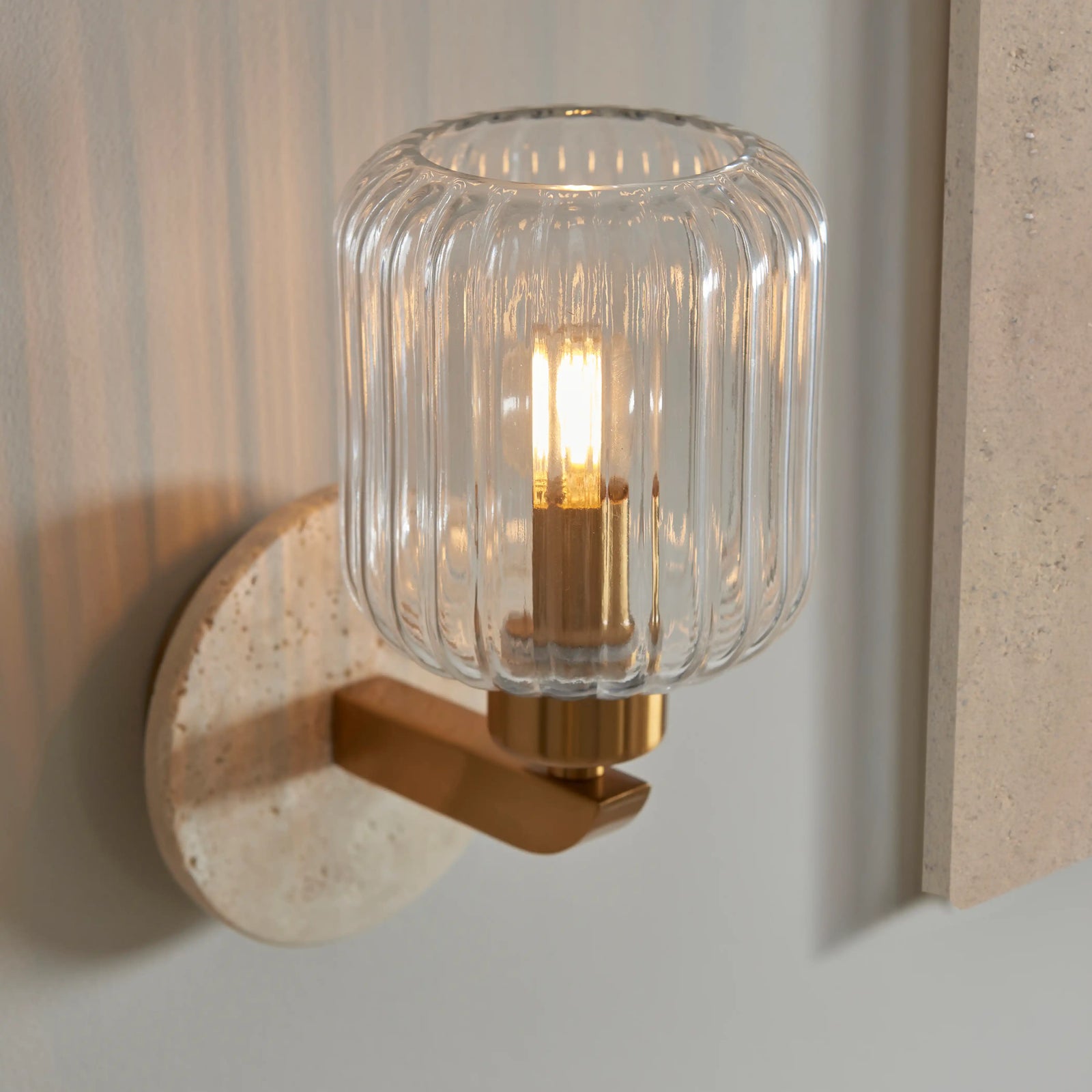 Nolan Ribbed Wall Light | Natural Travertine & Brass